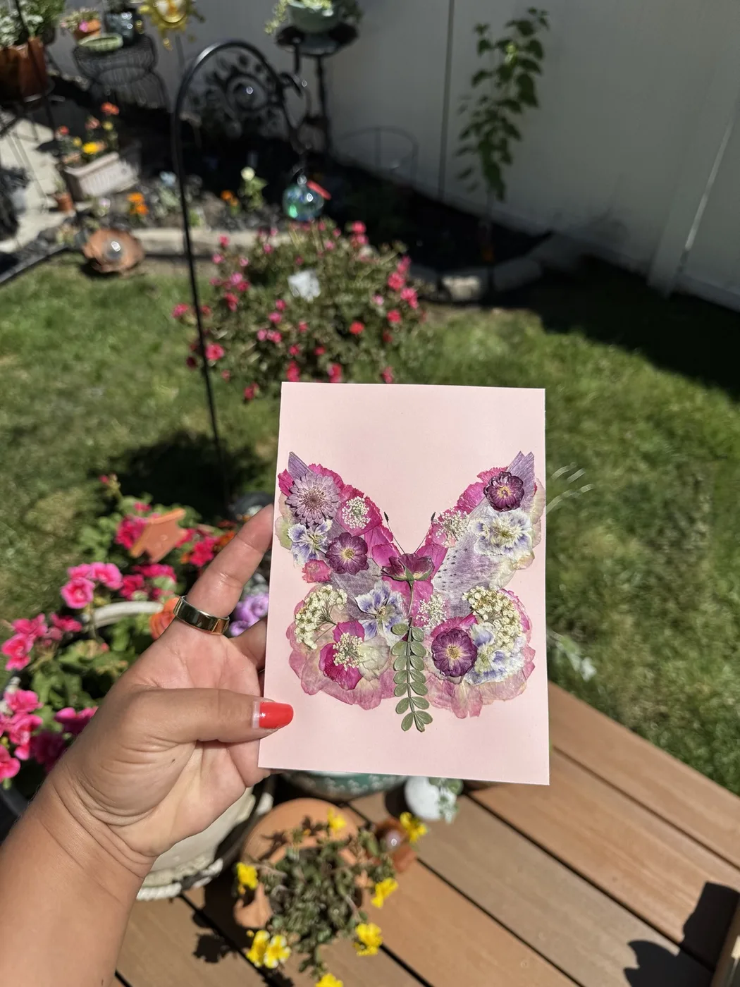 A pressed flower butterfly keepsake made from the bouquet