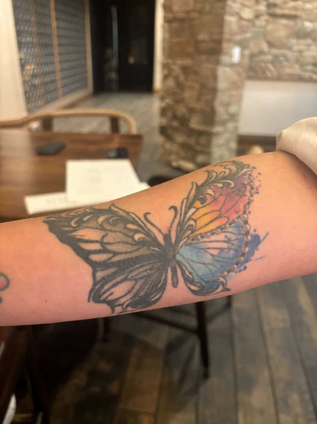 A butterfly tattoo in memory of a friend